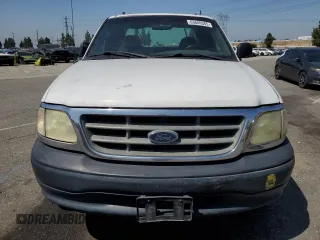 2003 Ford F-150 XL with VIN 1FTRX17W53NA54971, listed as a Copart auction lot 63686385 with 133,800 mi miles and Salvage title. Bid and sale history available at DreamBid. Image 5.