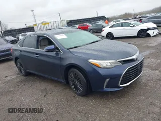 2016 Toyota Avalon Limited with VIN 4T1BK1EB2GU218605, listed as a IAAI auction lot 42016041 with 76,850 mi miles. Bid and sale history available at carsss.com. Image 1.