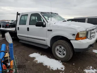 2000 Ford Super Duty F-250 XL with VIN 1FTNW21SXYEB02887, listed as a Copart auction lot 79716124 with 184,020 mi miles and Salvage Title. Bid and sale history available at carsss.com. Image 4.