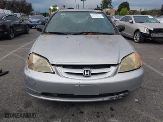 2002 Honda Civic LX with VIN 1HGEM22532L024309, listed as a IAAI auction lot 41777543 with 202,512 mi miles. Bid and sale history available at carsss.com. Image 6.
