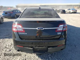 2015 Ford Taurus SEL with VIN 1FAHP2E90FG148821, listed as a Copart auction lot 77557384 with 141,514 mi miles and Salvage Title. Bid and sale history available at DreamBid. Image 6.