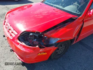 2003 Hyundai Accent GL with VIN KMHCG45C93U487209, listed as a IAAI auction lot 41590636 with 118,811 mi miles. Bid and sale history available at carsss.com. Image 6.