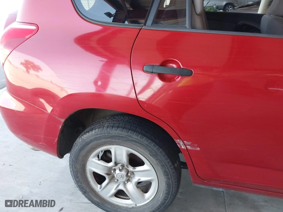 2007 Toyota RAV4 with VIN JTMZD33V076033253, listed as a IAAI auction lot 41963951 with 247,443 mi miles. Bid and sale history available at carsss.com. Image 6.