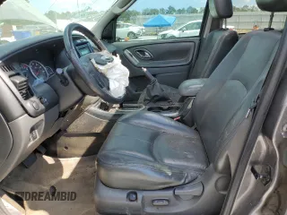 2006 Mazda Tribute S with VIN 4F2YZ06186KM08378, listed as a Copart auction lot 69391894 with Not Provided miles and Salvage Title. Bid and sale history available at DreamBid. Image 7.
