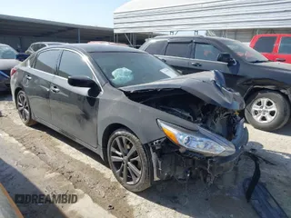 2018 Nissan Altima 2.5 SR with VIN 1N4AL3AP4JC284490, listed as a IAAI auction lot 41795563 with 112,936 mi miles. Bid and sale history available at carsss.com. Image 1.