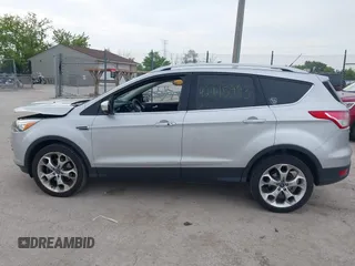 2013 Ford Escape Titanium with VIN 1FMCU9J97DUD16072, listed as a IAAI auction lot 42445993 with 111,255 mi miles and . Bid and sale history available at DreamBid. Image 14.