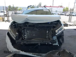 2021 Volkswagen Atlas SE z VIN 1V2HR2CA8MC514027, wystawiony jako IAAI lot #42260413 z przebiegiem 37 687 mil mil oraz . Historia ofert i sprzedaży dostępna na DreamBid. Obrazek 12.