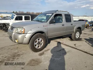 2003 Nissan Frontier SVE with VIN 1N6MD27Y23C411946, listed as a Copart auction lot 88362135 with 157,105 mi miles and Clean title. Bid and sale history available at DreamBid. Image 1.
