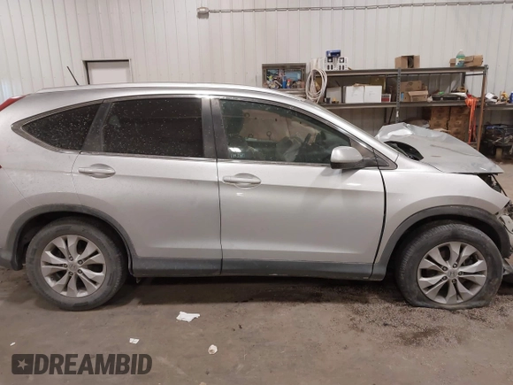 2012 Honda CR-V EX-L with VIN 2HKRM3H70CH513223, listed as a IAAI auction lot 41389365 with 94,516 mi miles. Bid and sale history available at carsss.com. Image 14.