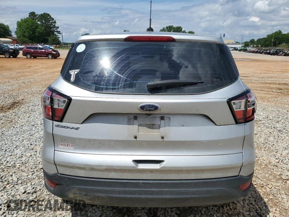 2018 Ford Escape S with VIN 1FMCU0F78JUB79464, listed as a Copart auction lot 58812925 with 104,642 mi miles and Salvage title. Bid and sale history available at DreamBid. Image 6.