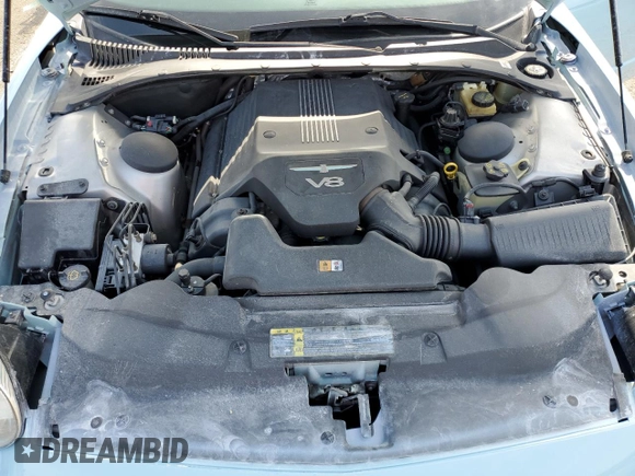 2004 Ford Thunderbird Deluxe z VIN 1FAHP60A14Y103516, wystawiony jako Copart lot #52055585 z przebiegiem 69 655 mil mil oraz Szkoda całkowita • Salvage title. Historia ofert i sprzedaży dostępna na DreamBid. Obrazek 11.
