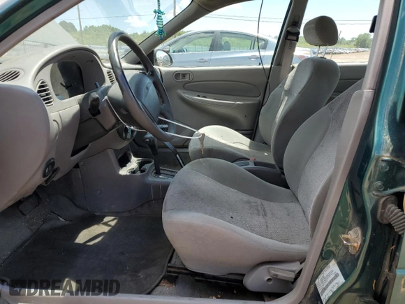 2000 Ford Escort with VIN 3FAFP13P6YR167405, listed as a Copart auction lot 60447535 with 128,413 mi miles and Clean title. Bid and sale history available at DreamBid. Image 7.