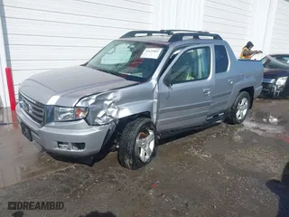 2014 Honda Ridgeline RTL with VIN 5FPYK1F51EB012843, listed as a IAAI auction lot 41629002 with 114,761 mi miles. Bid and sale history available at carsss.com. Image 18.