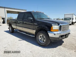 2001 Ford F-350 XL with VIN 3FTSW31F71MA76910, listed as a Copart auction lot 53083565 with 239,213 mi miles and Salvage Title. Bid and sale history available at DreamBid. Image 4.