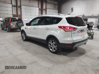 2016 Ford Escape Titanium with VIN 1FMCU9J95GUB02377, listed as a IAAI auction lot 41869557 with 88,441 mi miles. Bid and sale history available at carsss.com. Image 3.
