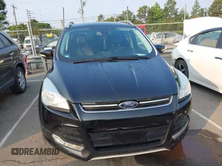 2015 Ford Escape Titanium с VIN 1FMCU0JX9FUB03122, выставлен на аукционе IAAI как лот 42401753 с пробегом 168 526 миль миль и . История ставок и продаж доступна на DreamBid. Изображение 6.