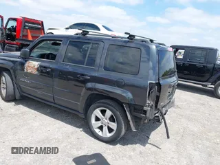 2014 Jeep Patriot Latitude with VIN 1C4NJPFA4ED604145, listed as a IAAI auction lot 42091619 with 81,119 mi miles and . Bid and sale history available at carsss.com. Image 3.