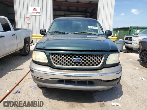 2002 Ford F-150 XL z VIN 1FTRX17W52NB81525, wystawiony jako Copart lot #57981075 z przebiegiem 236 673 mil mil oraz Szkoda całkowita • Salvage title. Historia ofert i sprzedaży dostępna na DreamBid. Obrazek 5.