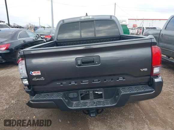 2023 Toyota Tacoma SR with VIN 3TYCZ5AN5PT138770, listed as a IAAI auction lot 41461423 with 19,785 mi miles and . Bid and sale history available at DreamBid. Image 16.