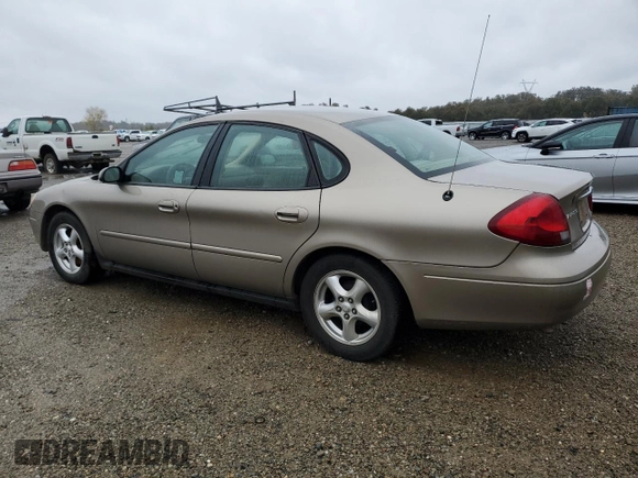 2003 Ford Taurus SE Standard with VIN 1FAFP53U03A252904, listed as a Copart auction lot 82175794 with 156,490 mi miles and Salvage Title. Bid and sale history available at carsss.com. Image 2.