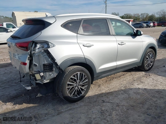 2020 Hyundai Tucson Sport with VIN KM8J33AL5LU217879, listed as a IAAI auction lot 41378700 with 82,684 mi miles. Bid and sale history available at carsss.com. Image 4.