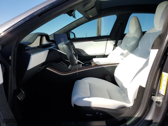2023 Tesla Model S with VIN 5YJSA1E5XPF516118, listed as a Copart auction lot 42147345 with 12,564 mi miles and Salvage Title. Bid and sale history available at carsss.com. Image 7.