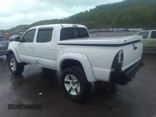 2011 Toyota Tacoma with VIN 5TFLU4ENXBX022207, listed as a IAAI auction lot 36494648 with 75,782 mi miles and . Bid and sale history available at DreamBid. Image 3.
