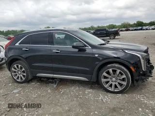 2019 Cadillac XT4 FWD Premium Luxury z VIN 1GYFZCR49KF147242, wystawiony jako Copart lot #55483215 z przebiegiem 94 990 mil mil oraz Szkody całkowita. Historia ofert i sprzedaży dostępna na DreamBid. Obrazek 4.