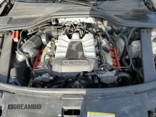 2014 Audi A8 3.0T z VIN WAURGAFD5EN009612, wystawiony jako Copart lot #49860895 z przebiegiem 170 973 mil mil oraz Szkoda całkowita • Salvage title. Historia ofert i sprzedaży dostępna na DreamBid. Obrazek 11.