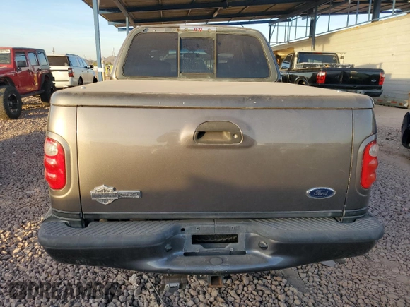 2002 Ford F-150 Harley Davidson with VIN 1FTRW07332KE04049, listed as a Copart auction lot 84742654 with 287,346 mi miles and Salvage Title. Bid and sale history available at carsss.com. Image 6.