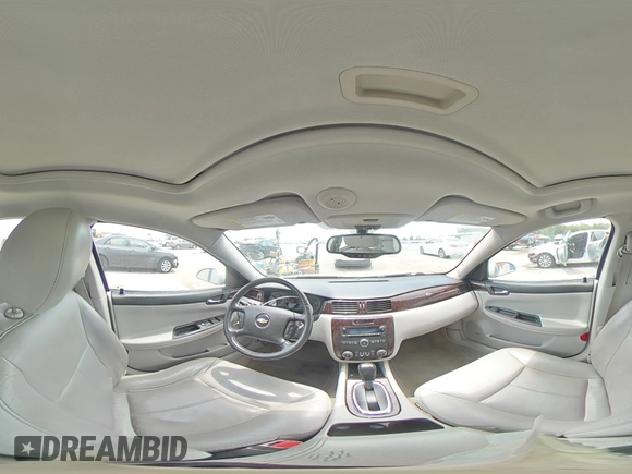 2012 Chevrolet Impala LTZ with VIN 2G1WC5E33C1131846, listed as a Copart auction lot 54431515 with 228,537 mi miles and Salvage Title. Bid and sale history available at DreamBid. Image 14.