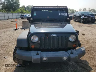 2012 Jeep Wrangler Unlimited Sport with VIN 1C4BJWDG8CL116811, listed as a Copart auction lot 59372085 with 95,498 mi miles and Salvage title. Bid and sale history available at DreamBid. Image 5.