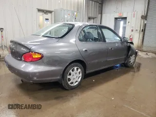 2000 Hyundai Elantra GLS z VIN KMHJF35F1YU995390, wystawiony jako Copart lot #78523024 z przebiegiem 130 349 mil mil oraz Szkoda całkowita • Salvage title. Historia ofert i sprzedaży dostępna na DreamBid. Obrazek 3.