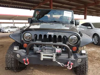 2011 Jeep Wrangler Rubicon with VIN 1J4BA6D13BL545343, listed as a IAAI auction lot 40980056 with 107,207 mi miles and . Bid and sale history available at carsss.com. Image 12.