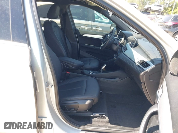 2021 BMW X1 sDrive28i with VIN WBXJG7C06M5T14235, listed as a IAAI auction lot 42021762 with 53,384 mi miles and . Bid and sale history available at DreamBid. Image 5.