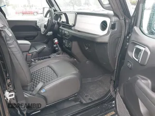 2025 Jeep Wrangler Sport S with VIN 1C4PJXDG9SW559915, listed as a IAAI auction lot 42653116 with 1,730 mi miles and . Bid and sale history available at DreamBid. Image 5.