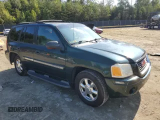 2003 GMC Envoy SLT with VIN 1GKDT13S032396374, listed as a Copart auction lot 74675134 with 115,280 mi miles and Salvage Title. Bid and sale history available at carsss.com. Image 4.