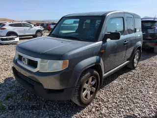 2011 Honda Element EX z VIN 5J6YH1H75BL001482, wystawiony jako Copart lot #59041055 z przebiegiem 206 361 mil mil oraz Szkoda całkowita • Salvage title. Historia ofert i sprzedaży dostępna na DreamBid. Obrazek 1.