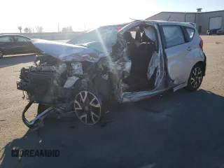2015 Nissan Note SR z VIN 3N1CE2CP9FL366119, wystawiony jako Copart lot #84079564 z przebiegiem Nie podano mil oraz Szkoda całkowita • Salvage title. Historia ofert i sprzedaży dostępna na DreamBid. Obrazek 1.