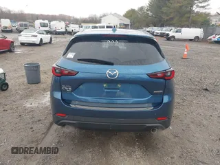 2023 Mazda CX-5 S Carbon Edition z VIN JM3KFBCM4P0264891, wystawiony jako IAAI lot #40933700 z przebiegiem 18 714 mil mil oraz . Historia ofert i sprzedaży dostępna na DreamBid. Obrazek 16.