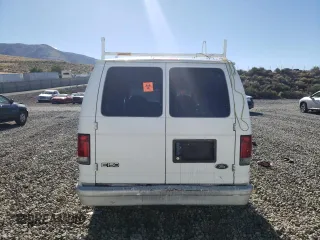 1999 Ford Econoline Cargo with VIN 1FTRE142XXHB29496, listed as a Copart auction lot 64516444 with 206,951 mi miles and Salvage Title. Bid and sale history available at carsss.com. Image 6.