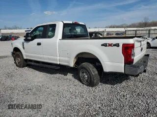 2019 Ford F-250 XL with VIN 1FT7X2B61KEG32082, listed as a Copart auction lot 49965105 with 104,658 mi miles and Salvage Title. Bid and sale history available at DreamBid. Image 2.