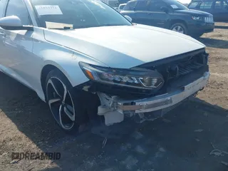 2020 Honda Accord Sport with VIN 1HGCV1F38LA136723, listed as a IAAI auction lot 41853774 with 202,377 mi miles and . Bid and sale history available at DreamBid. Image 16.