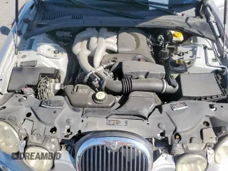 2003 Jaguar S-Type with VIN SAJEA01T43FM62477, listed as a Copart auction lot 52693085 with 109,761 mi miles and Salvage Title. Bid and sale history available at DreamBid. Image 11.