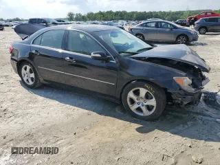 2005 Acura RL z VIN JH4KB16565C019863, wystawiony jako Copart lot #55317535 z przebiegiem 213 732 mil mil oraz Szkody całkowita. Historia ofert i sprzedaży dostępna na DreamBid. Obrazek 4.