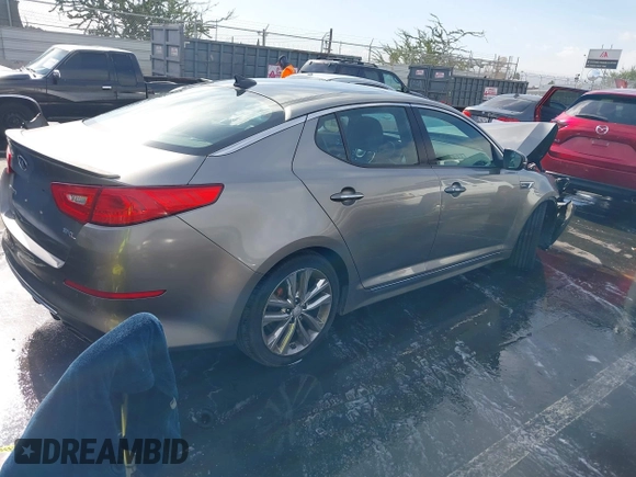 2015 Kia Optima SX Turbo with VIN 5XXGR4A69FG474261, listed as a IAAI auction lot 41103677 with 119,988 mi miles. Bid and sale history available at carsss.com. Image 4.