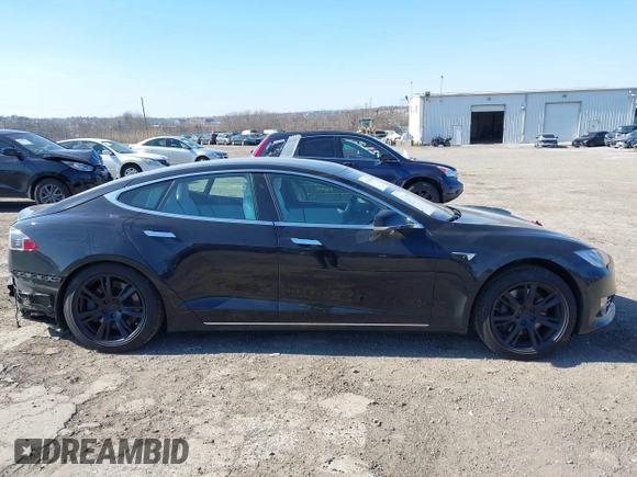 2020 Tesla Model S Long Range with VIN 5YJSA1E23LF381872, listed as a IAAI auction lot 41763046 with 96,720 mi miles and . Bid and sale history available at DreamBid. Image 14.