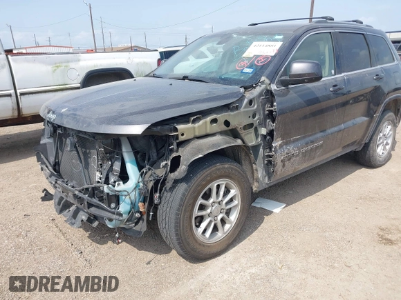 2020 Jeep Grand Cherokee Laredo E with VIN 1C4RJEAG2LC284912, listed as a IAAI auction lot 42114881 with 86,579 mi miles and . Bid and sale history available at DreamBid. Image 6.