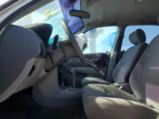 2001 Chevrolet Prizm z VIN 1Y1SK52831Z428219, wystawiony jako Copart lot #59614015 z przebiegiem 242 375 mil mil oraz Szkoda całkowita • Salvage title. Historia ofert i sprzedaży dostępna na DreamBid. Obrazek 7.