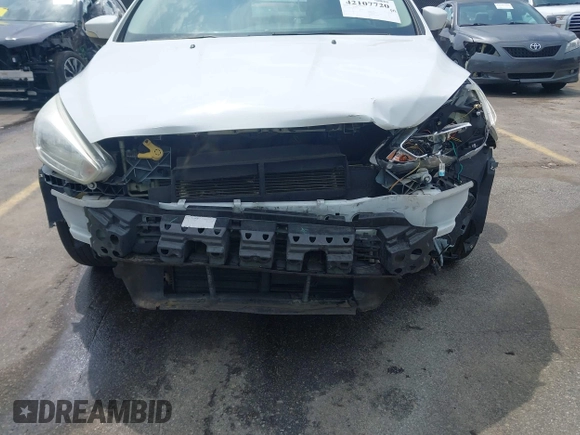 2015 Ford Focus SE with VIN 1FADP3F28FL204145, listed as a IAAI auction lot 42107720 with 129,441 mi miles and . Bid and sale history available at DreamBid. Image 6.